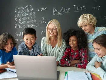 Students learning together with a teacher